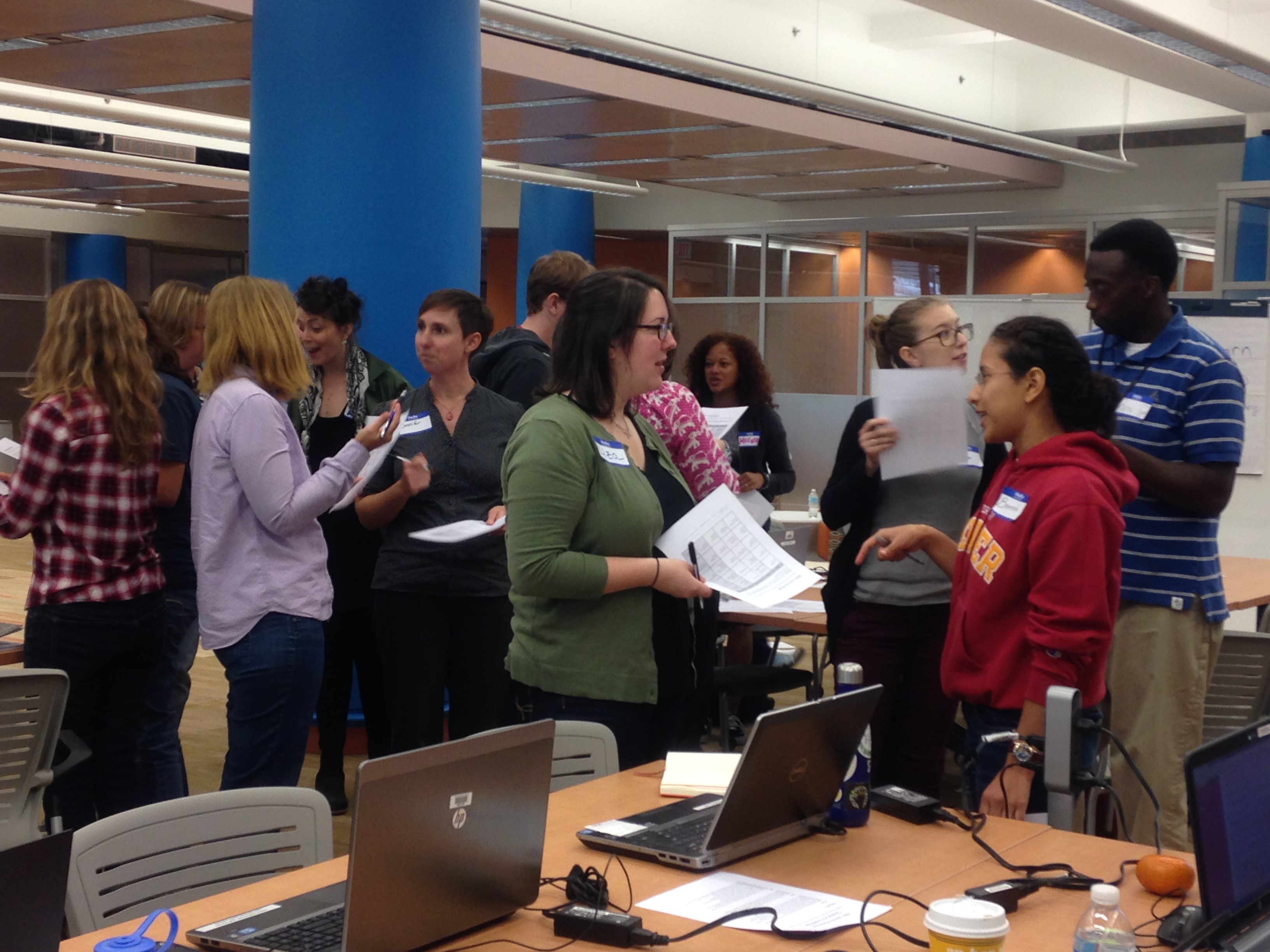 An image of two activity participants talking about their vocabulary cards